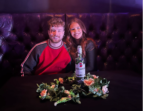 Two people sitting around a table